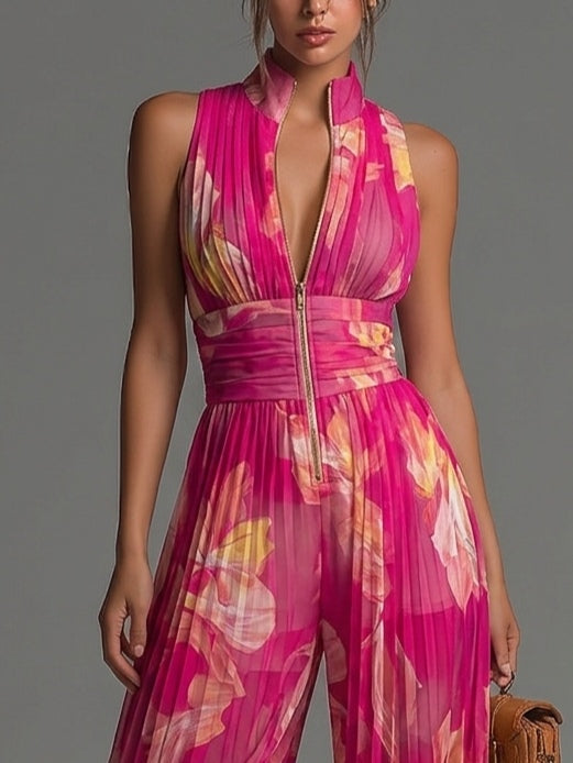 Jumpsuit senza maniche in chiffon plissettato con zip e stampa floreale fucsia